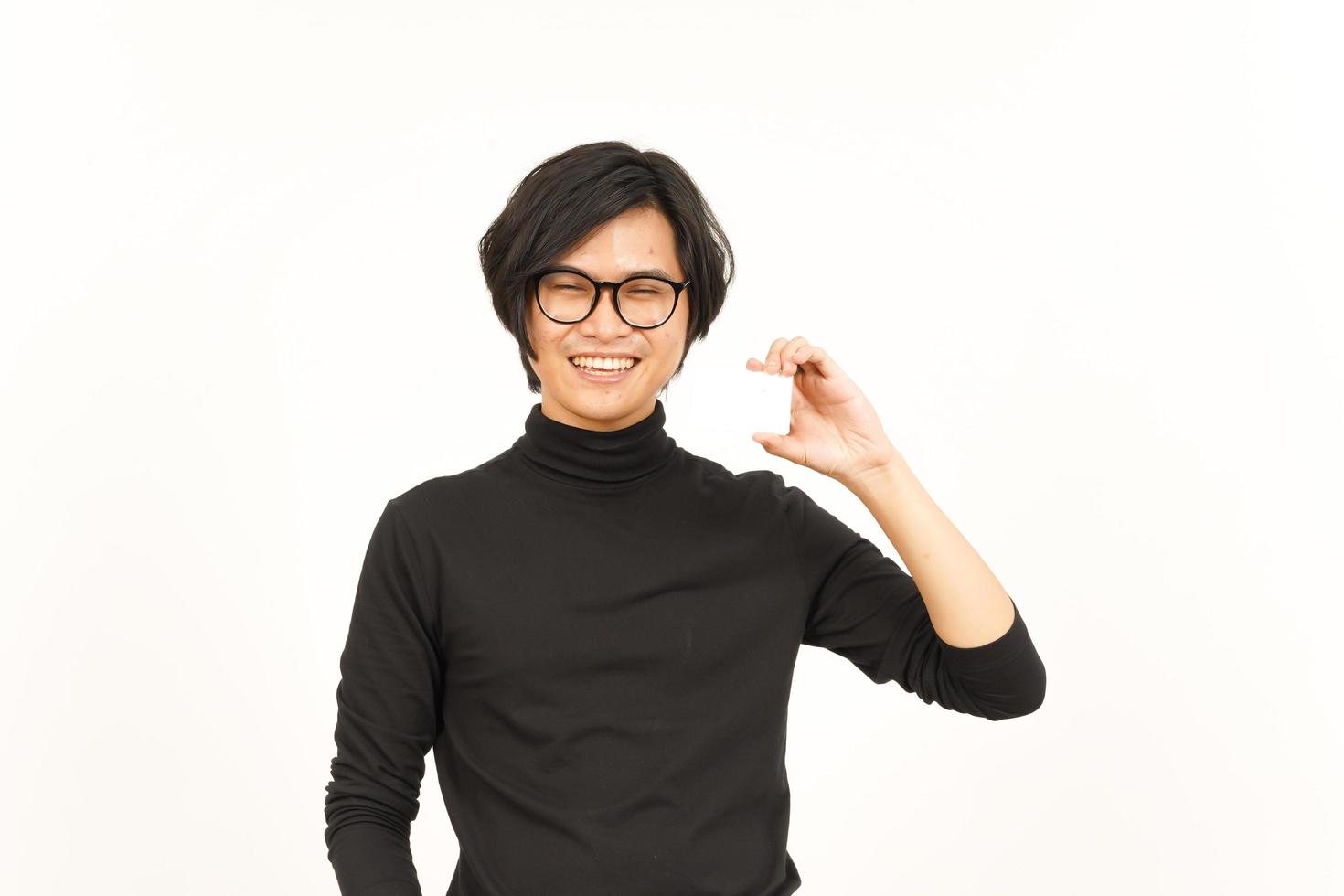 Holding and Showing Blank Credit or Bank Card Of Handsome Asian Man Isolated On White Background photo