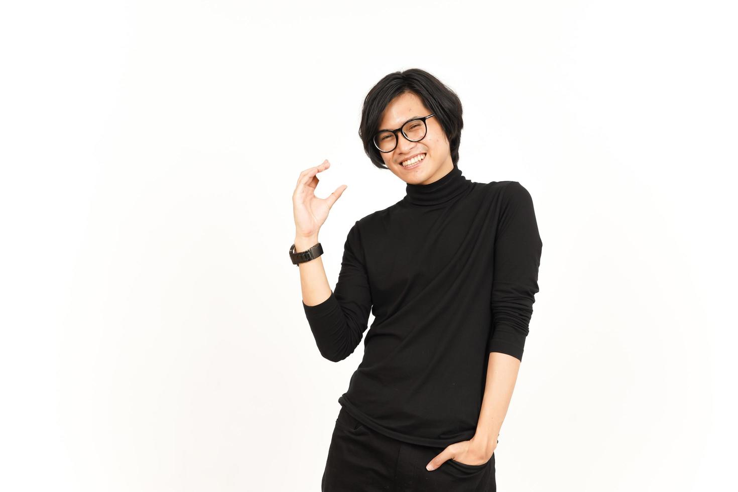 Holding and Showing Blank Credit or Bank Card Of Handsome Asian Man Isolated On White Background photo