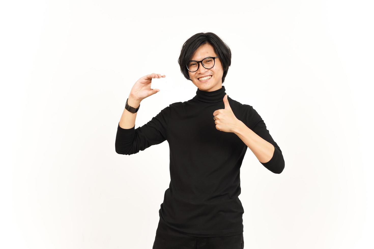 Holding and Showing Blank Credit or Bank Card Of Handsome Asian Man Isolated On White Background photo