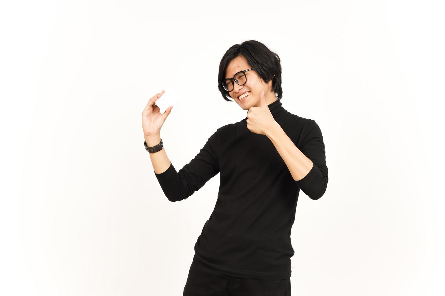 Holding and Showing Blank Credit or Bank Card Of Handsome Asian Man Isolated On White Background photo