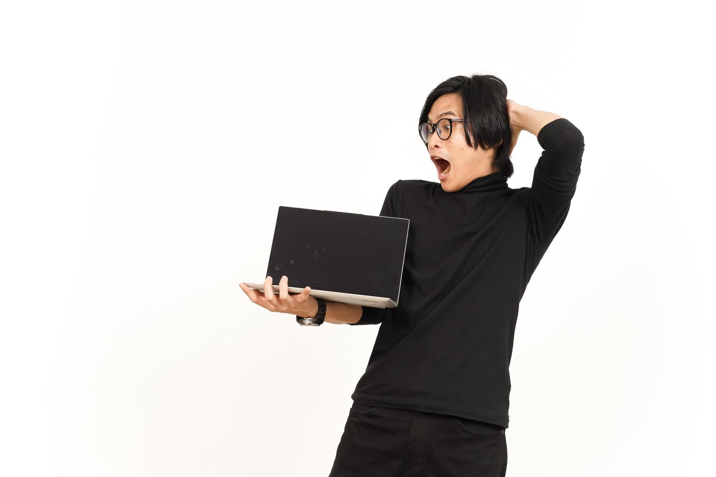 Showing Apps or Ads On Laptop Blank Screen Of Handsome Asian Man Isolated On White Background photo