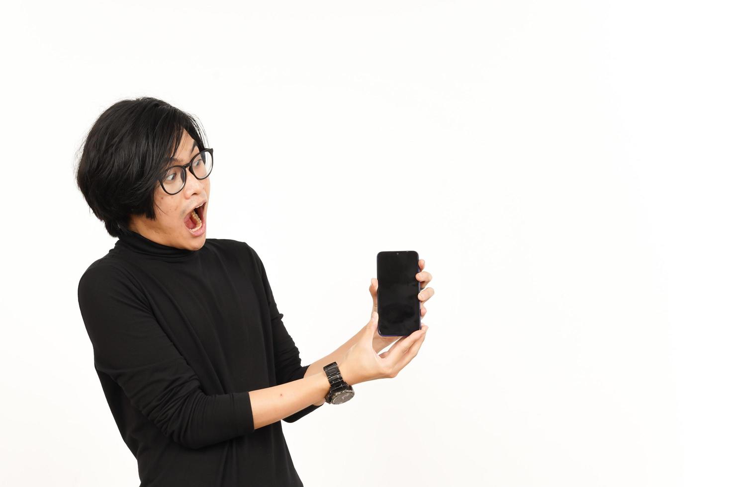 Showing Apps or Ads On Blank Screen Smartphone Of Handsome Asian Man Isolated On White Background photo