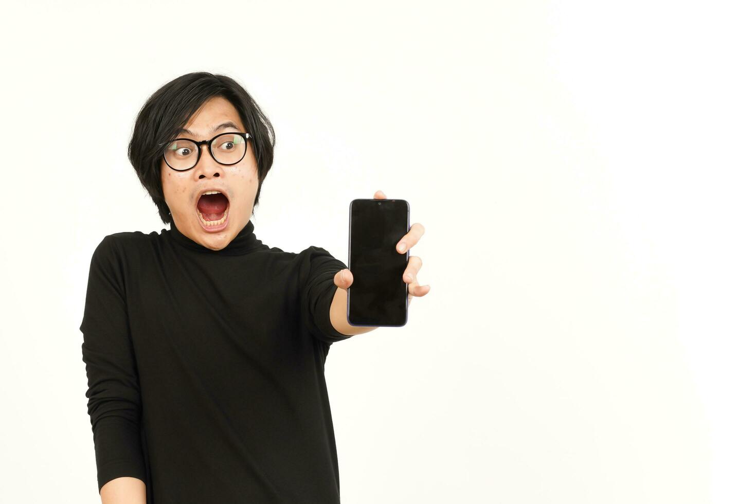 Showing Apps or Ads On Blank Screen Smartphone Of Handsome Asian Man Isolated On White Background photo
