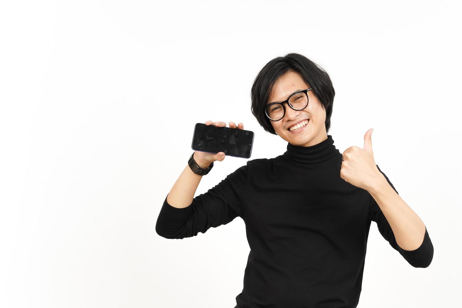 Showing Apps or Ads On Blank Screen Smartphone Of Handsome Asian Man Isolated On White Background photo