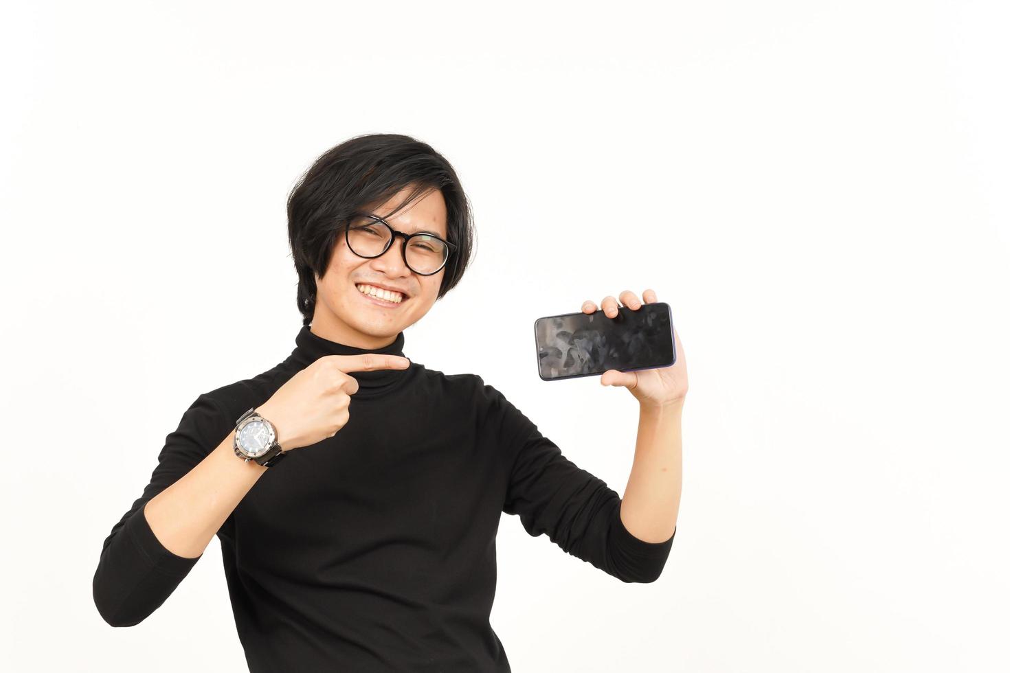 Showing Apps or Ads On Blank Screen Smartphone Of Handsome Asian Man Isolated On White Background photo