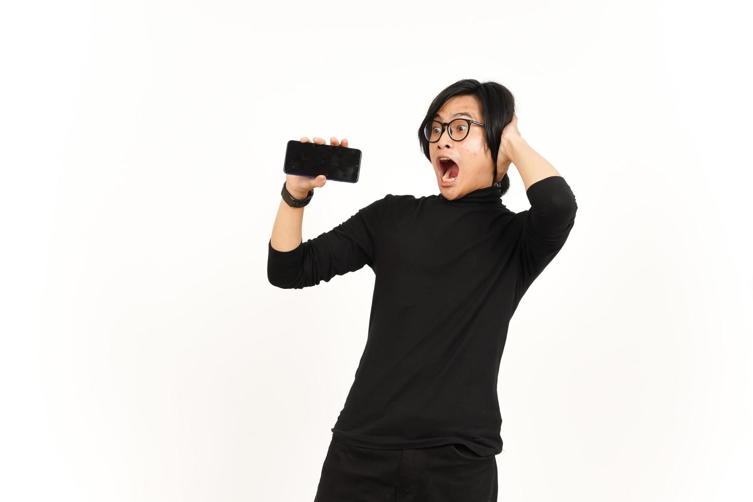 Showing Apps or Ads On Blank Screen Smartphone Of Handsome Asian Man Isolated On White Background photo