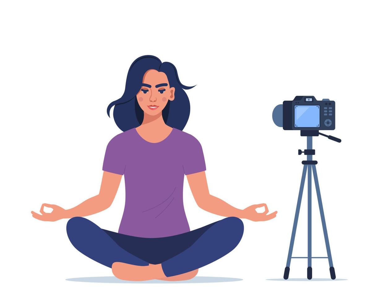 The girl is broadcasting yoga classes in her apartment. Young woman making meditation in lotus pose. Online Yoga Concept. Vector illustration.