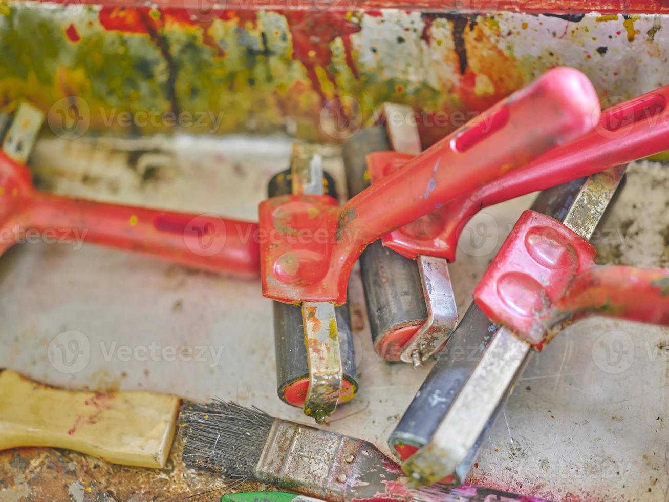 Row of artist paintbrushes closeup on artistic  background . photo