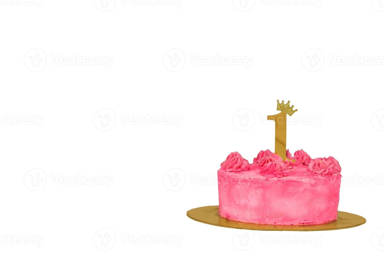 Background pink cake with the number 1 on a white background. First birthday. photo