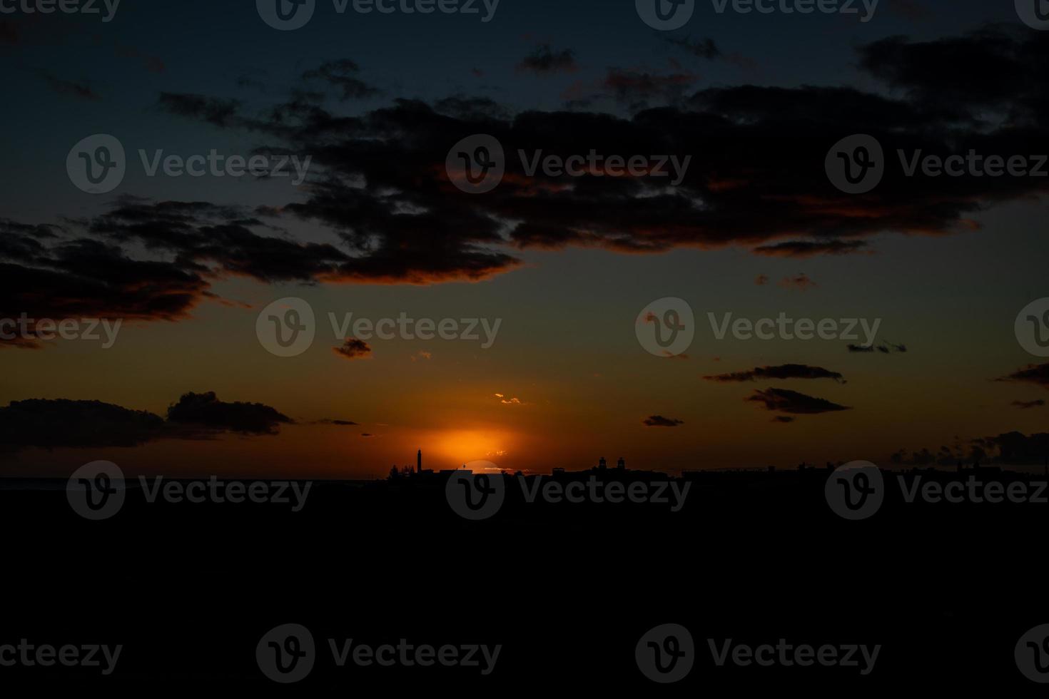 colorful sunset on the Spanish island of Gran Canaria in the Maspalomas dunes photo