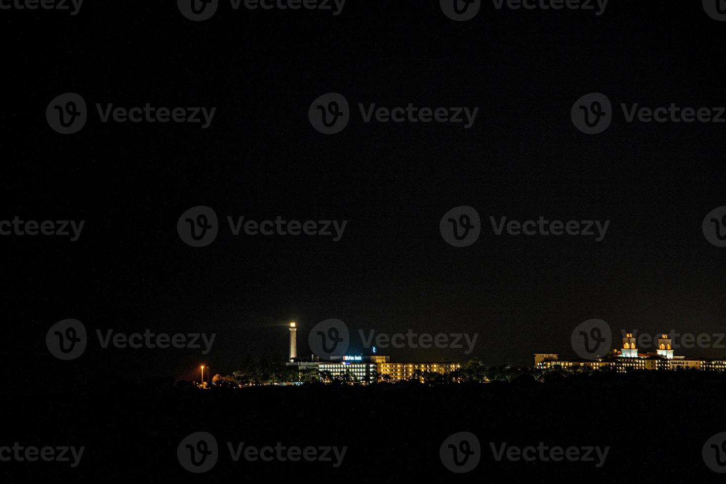 night view of the Maspalomas lighthouse in Spain in the Canary Islands photo