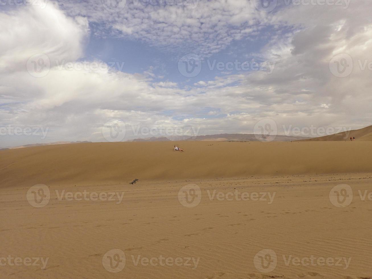 summer desert landscape on a warm sunny day from Maspalomas dunes on the Spanish island of Gran Canaria photo