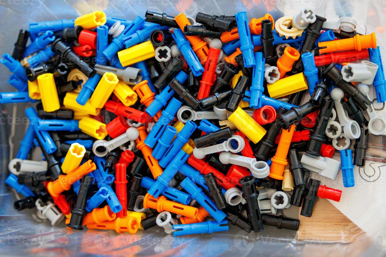 small lego technic bricks in a box photo
