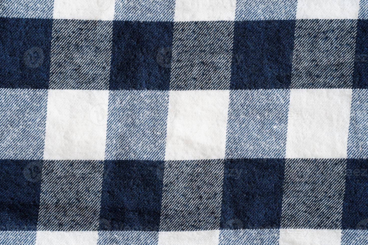 Blue and white checker pattern textile photo