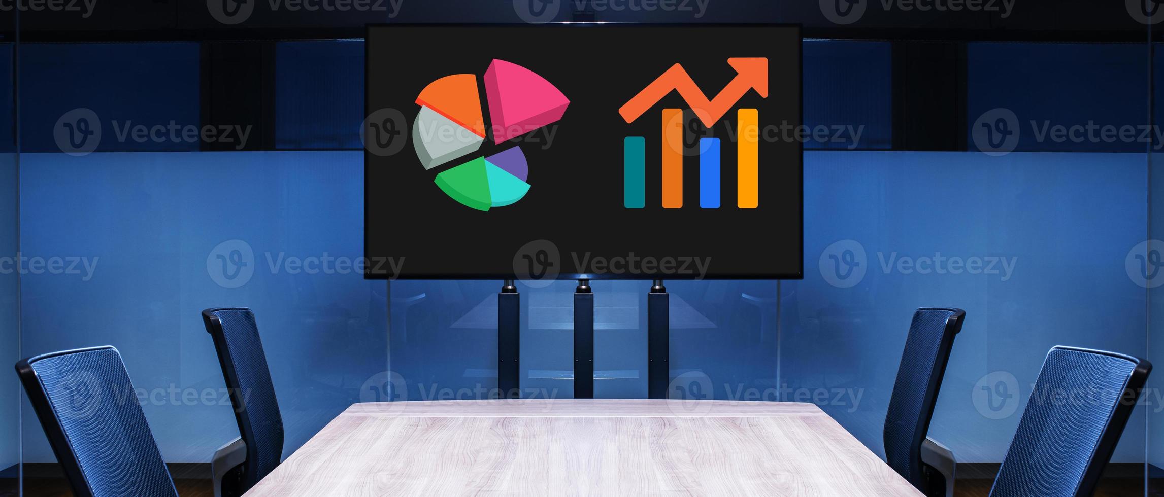 Television with diagram and chart on display in meeting room photo