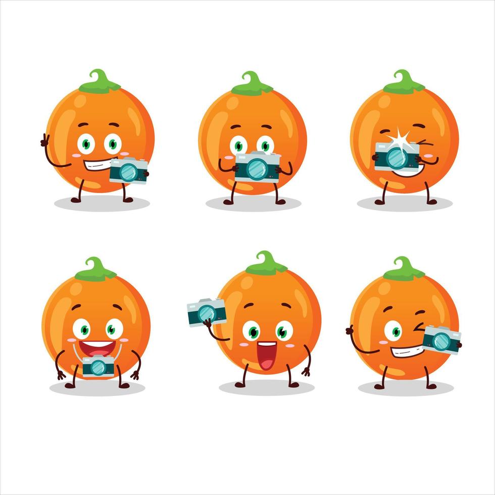 Photographer profession emoticon with halloween orange candy cartoon character vector