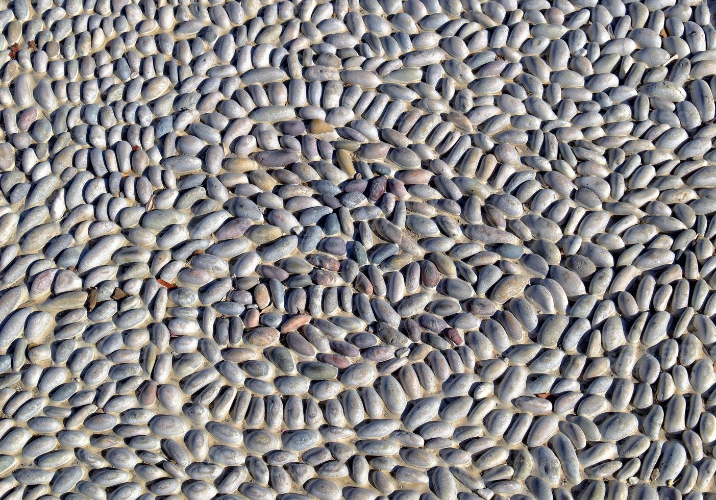 corazón forma arreglado desde gris piedras foto