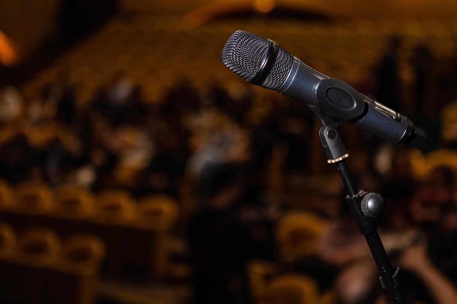 microphone in the background of the audience photo