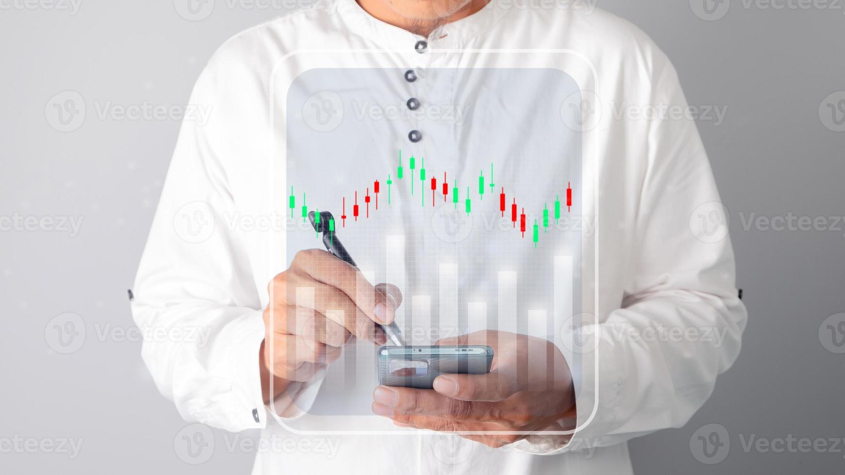 Businessman touching chart on smartphone screen. Investment stock market concept, stock investor photo