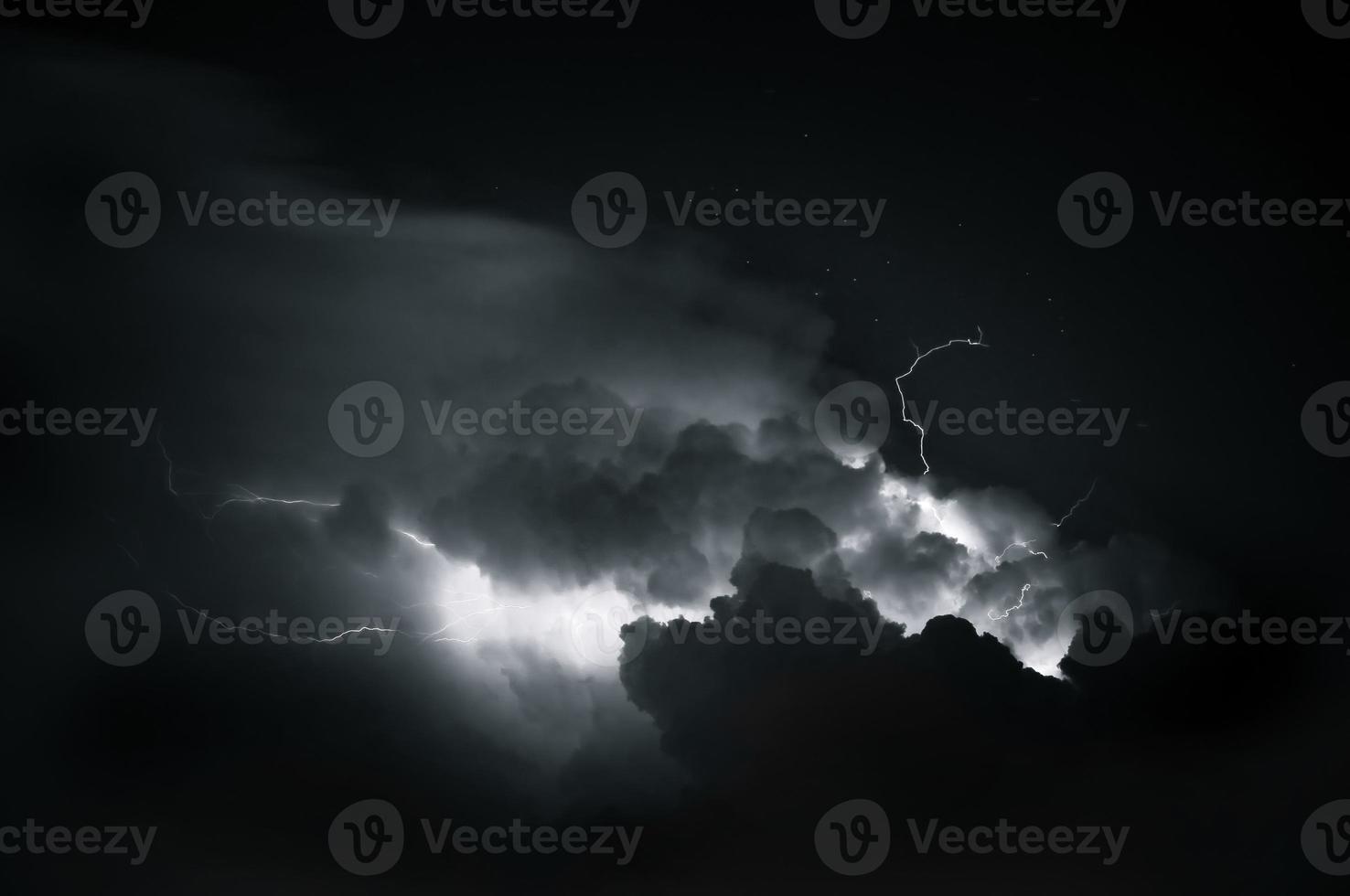 Lightning thunderstorm flash over the night sky. Concept on topic weather, cataclysms photo