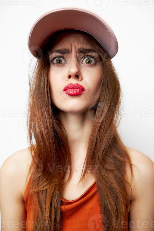 Woman with a cap Perplexed look charm model on her head sexy look photo