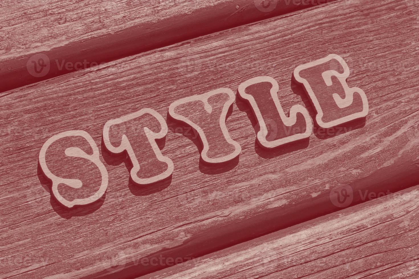 word style made of wooden letters on wooden bench photo