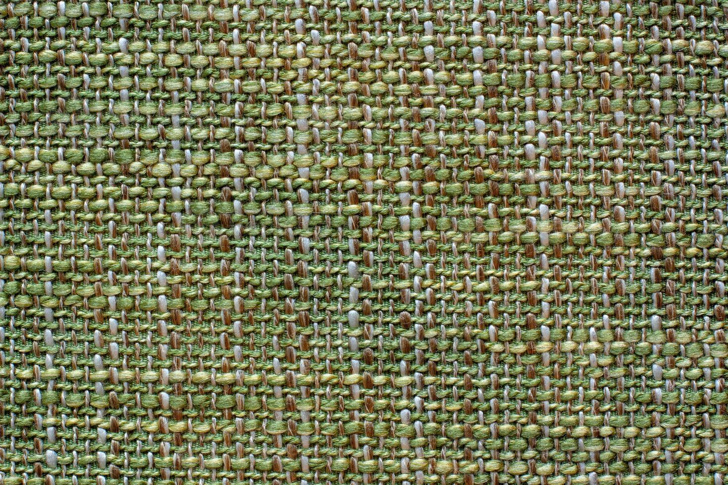 Color fabric texture. Woolen soft crumpled fabric of a green shade. Copy space. photo