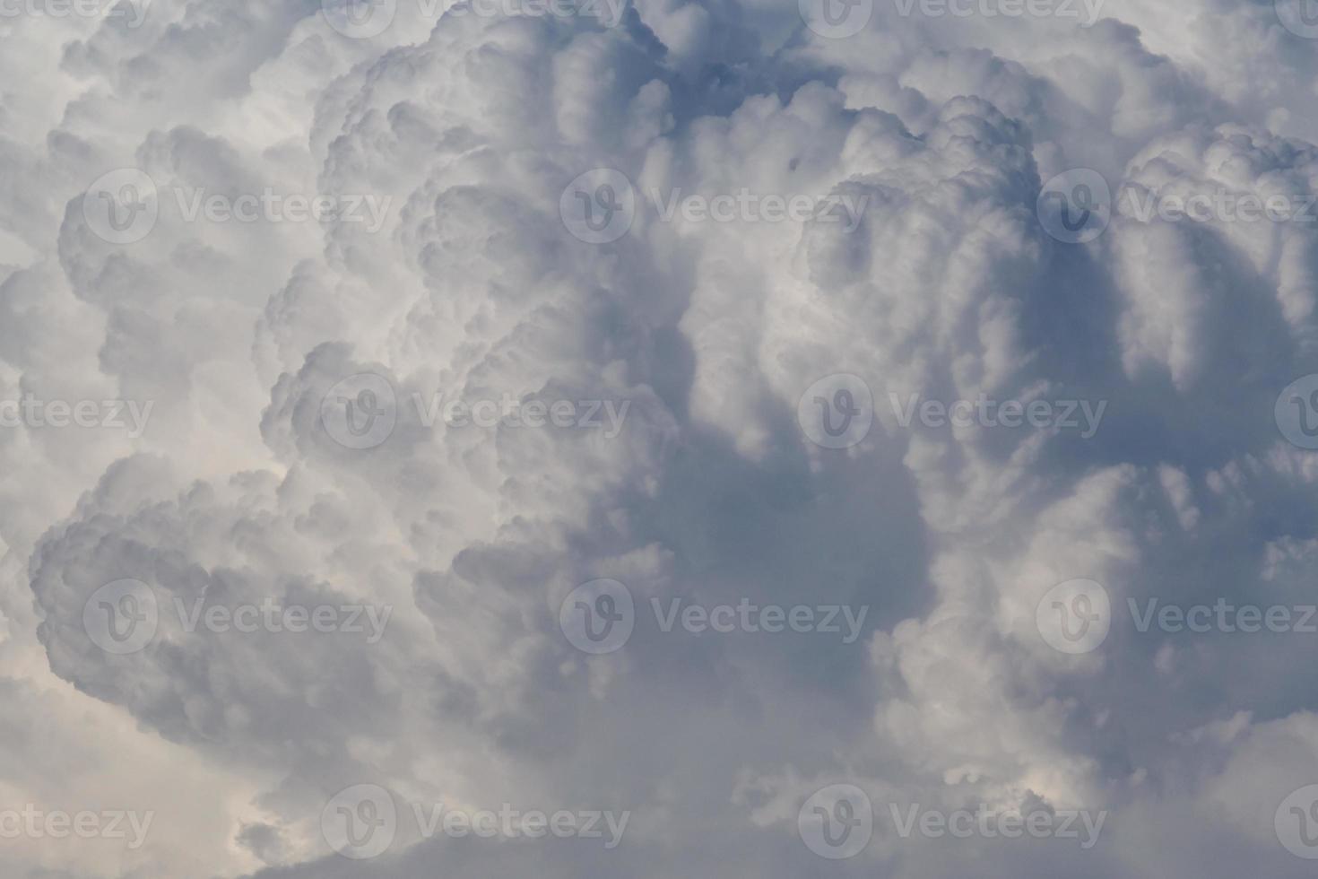 close up of huge rain clouds in a sky photo
