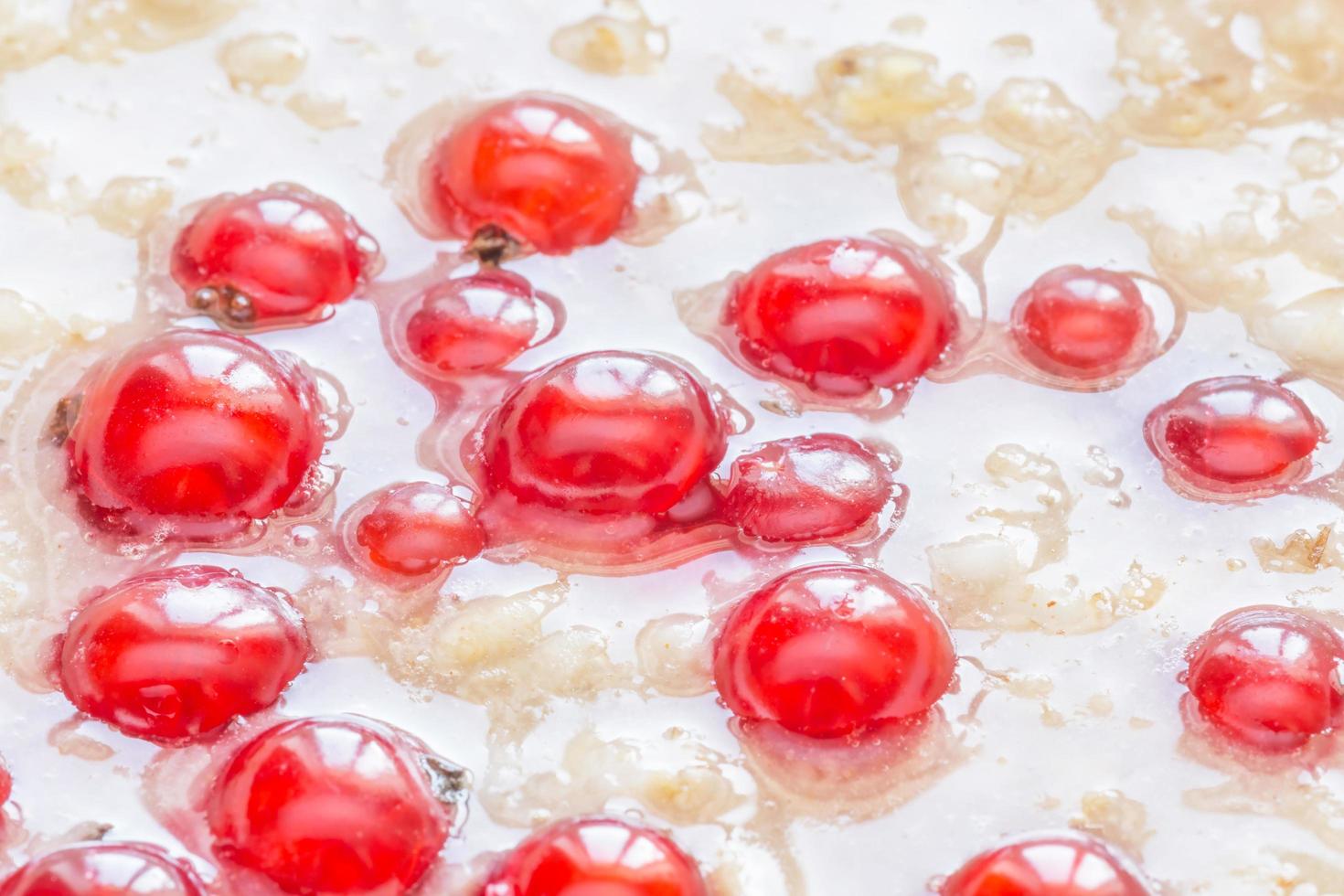 close up of oatmeal with red currant, cinnamon and honey photo