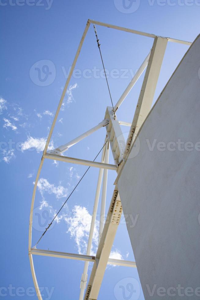 Detail of the structure of a steel structure against the blue sky. photo