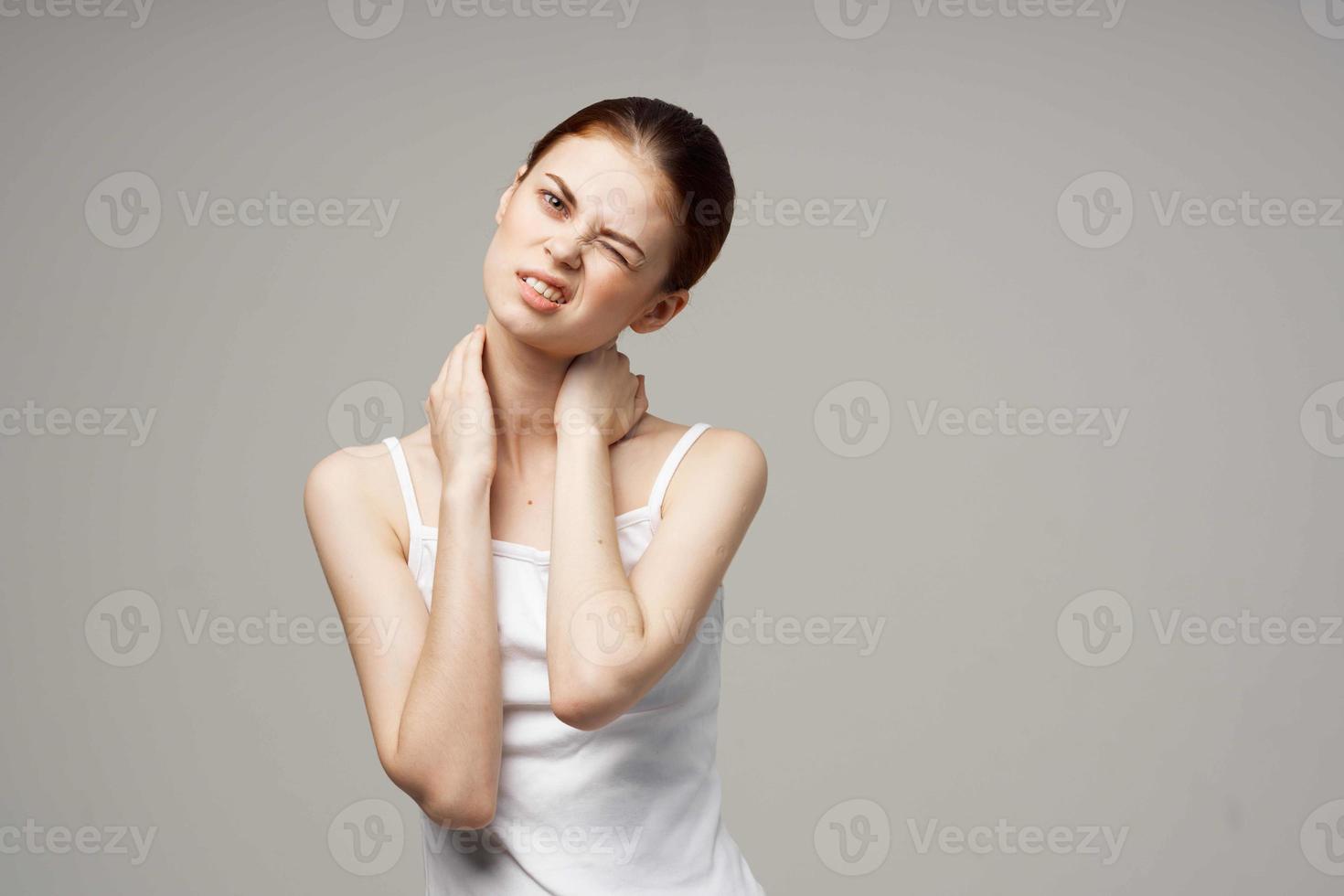 woman pain in the neck arthritis chronic disease isolated background photo