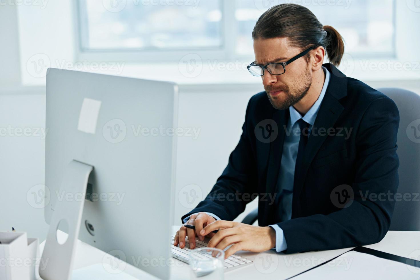 male manager an official is working at the computer Lifestyle photo