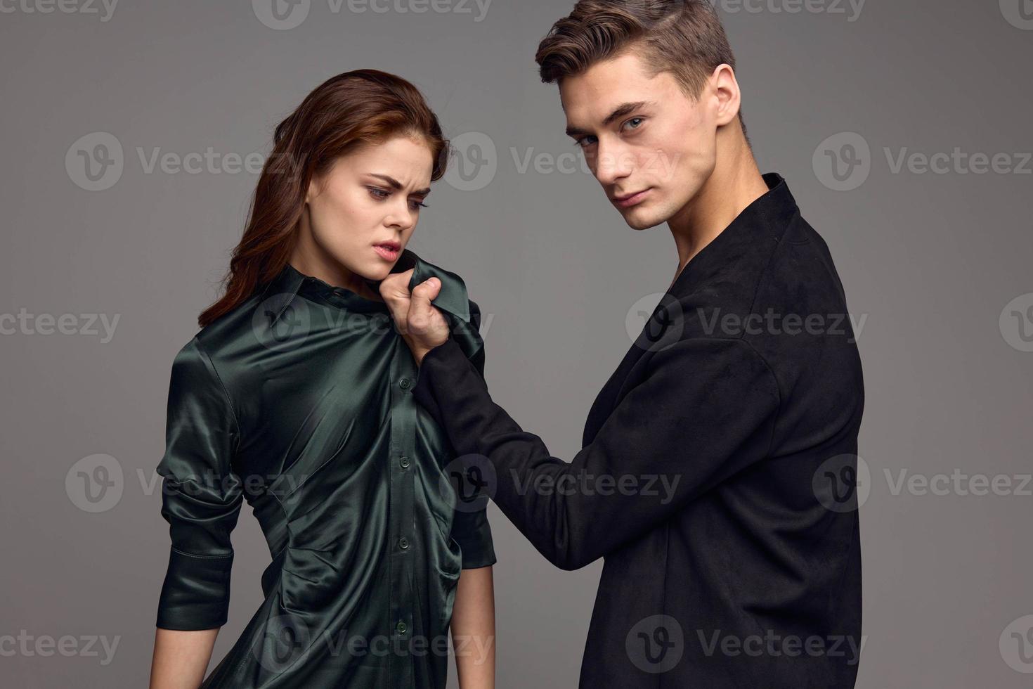 Woman experiencing pain at the hands of a man domestic violence choking photo