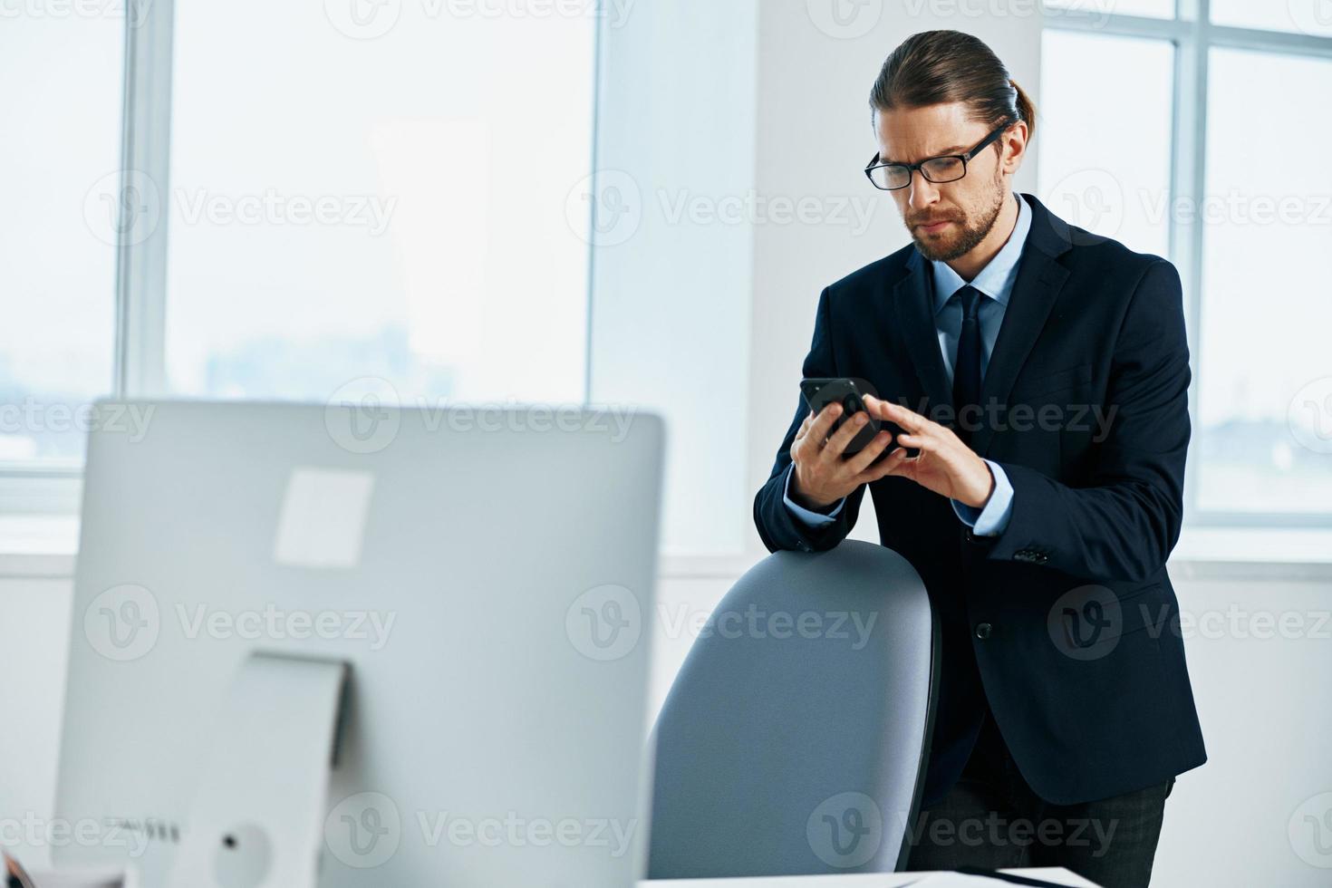 businessman near the desktop work process executive photo