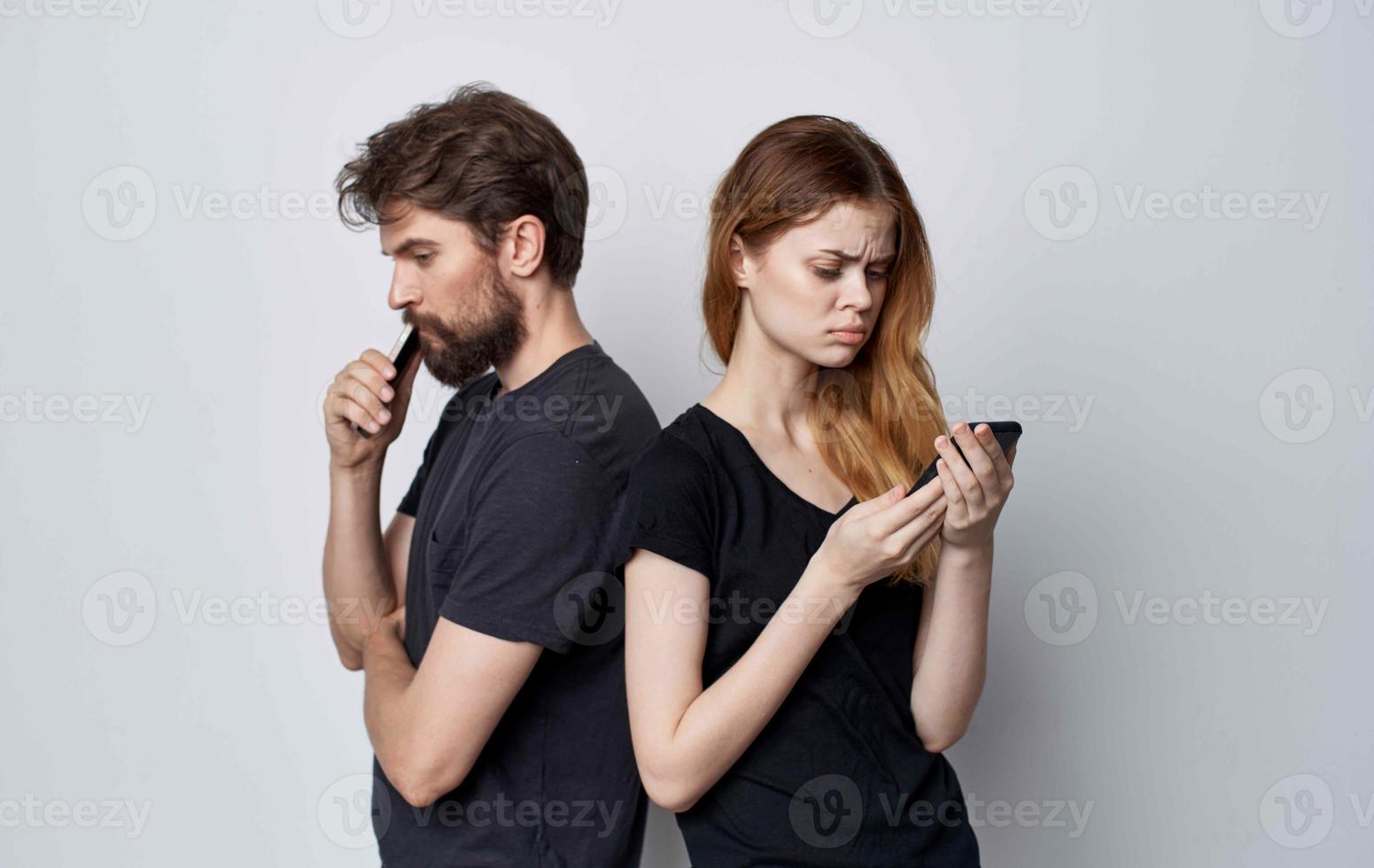 young couple in black t-shirts communication lifestyle friendship photo