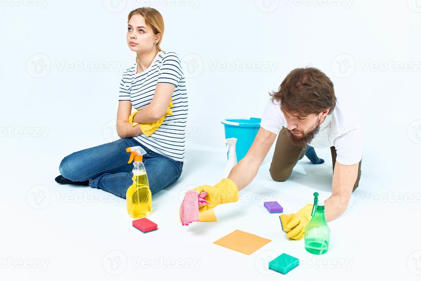 family washing floors cleaning supplies cleaning together homework photo