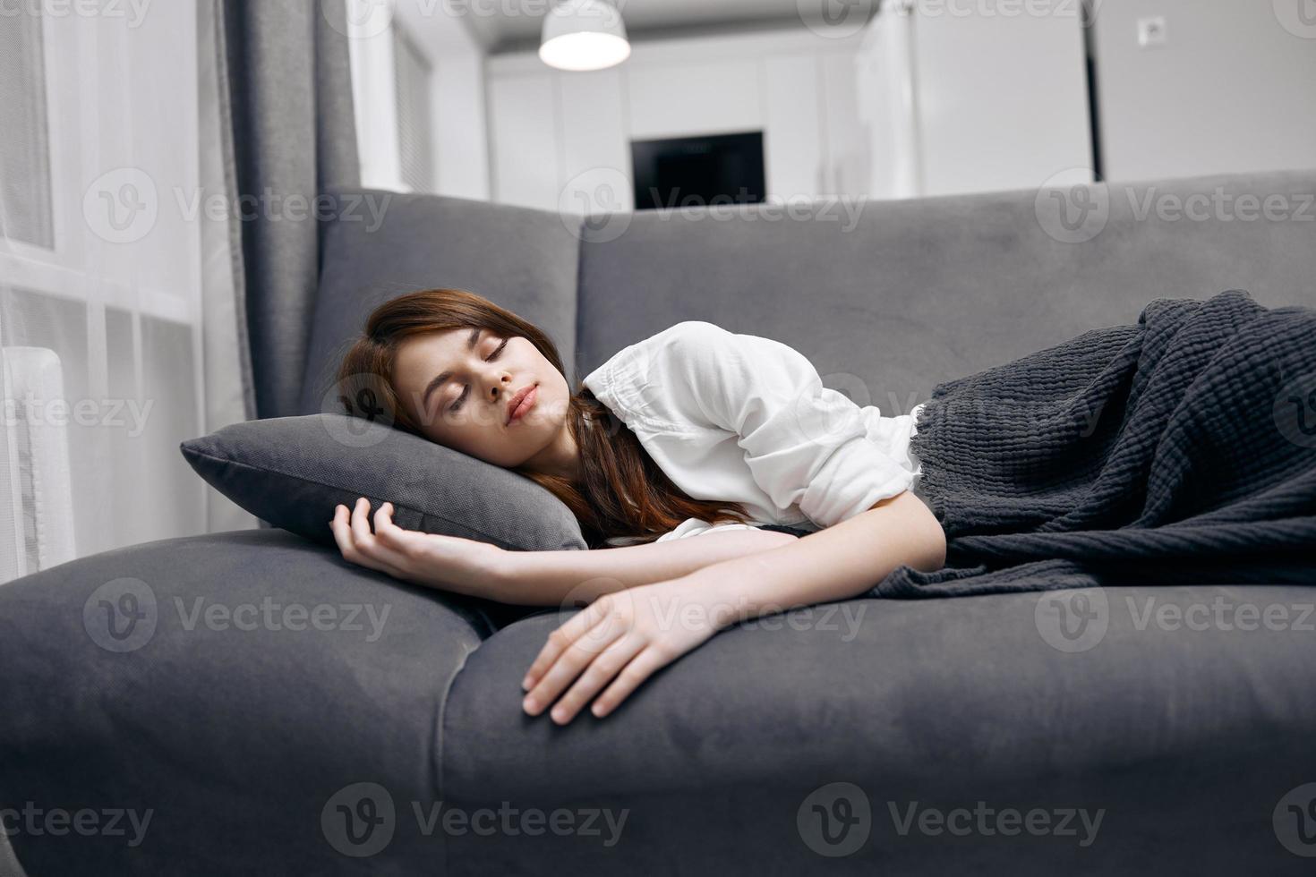 woman sleeping at home on the couch rest photo