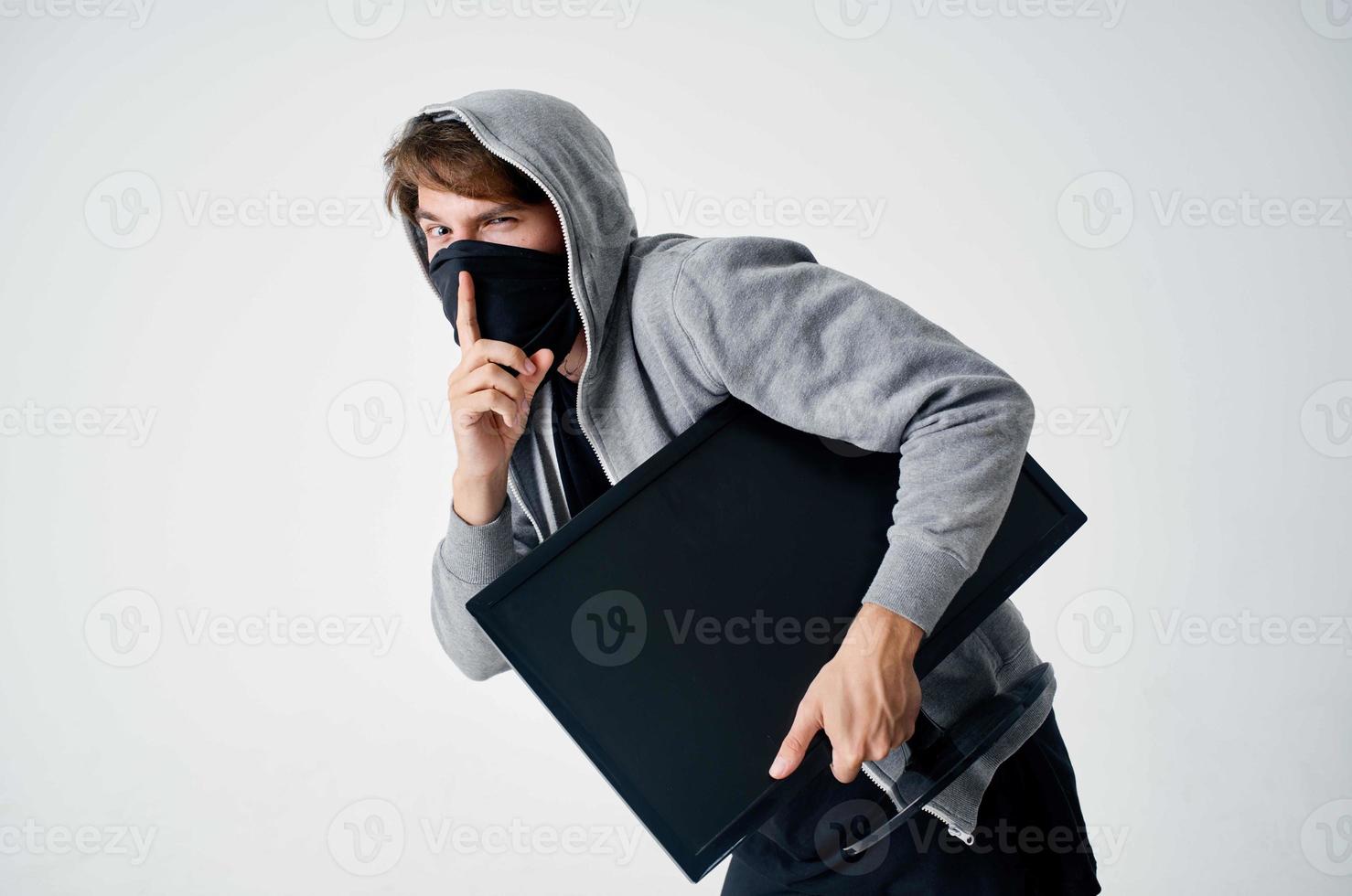 hacker stealth technique robbery safety hooligan light background photo