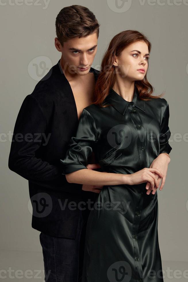 Man hugs woman from behind romance lifestyle attractiveness luxury studio photo