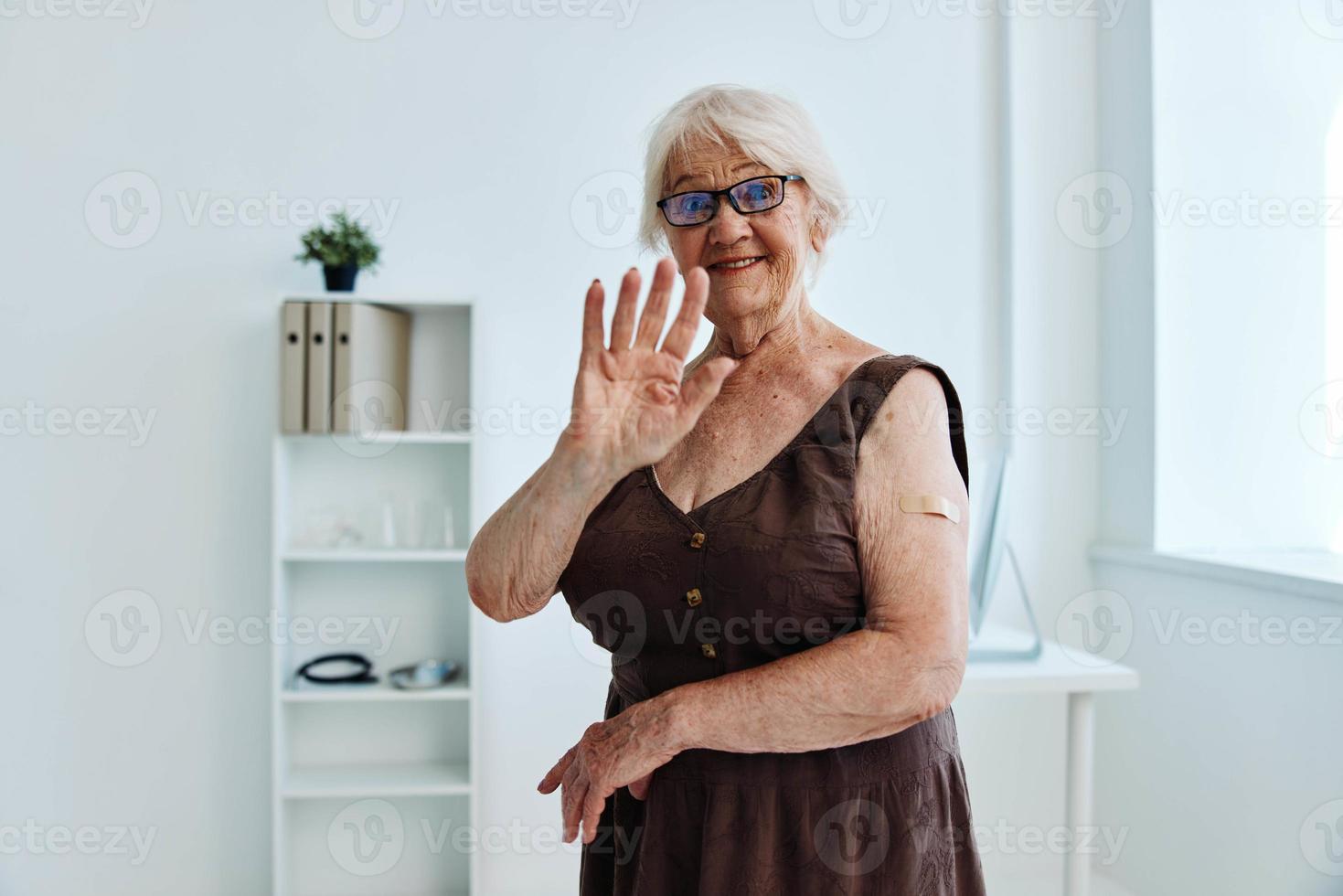a person with a plaster on his hand covid-19 passport health care photo