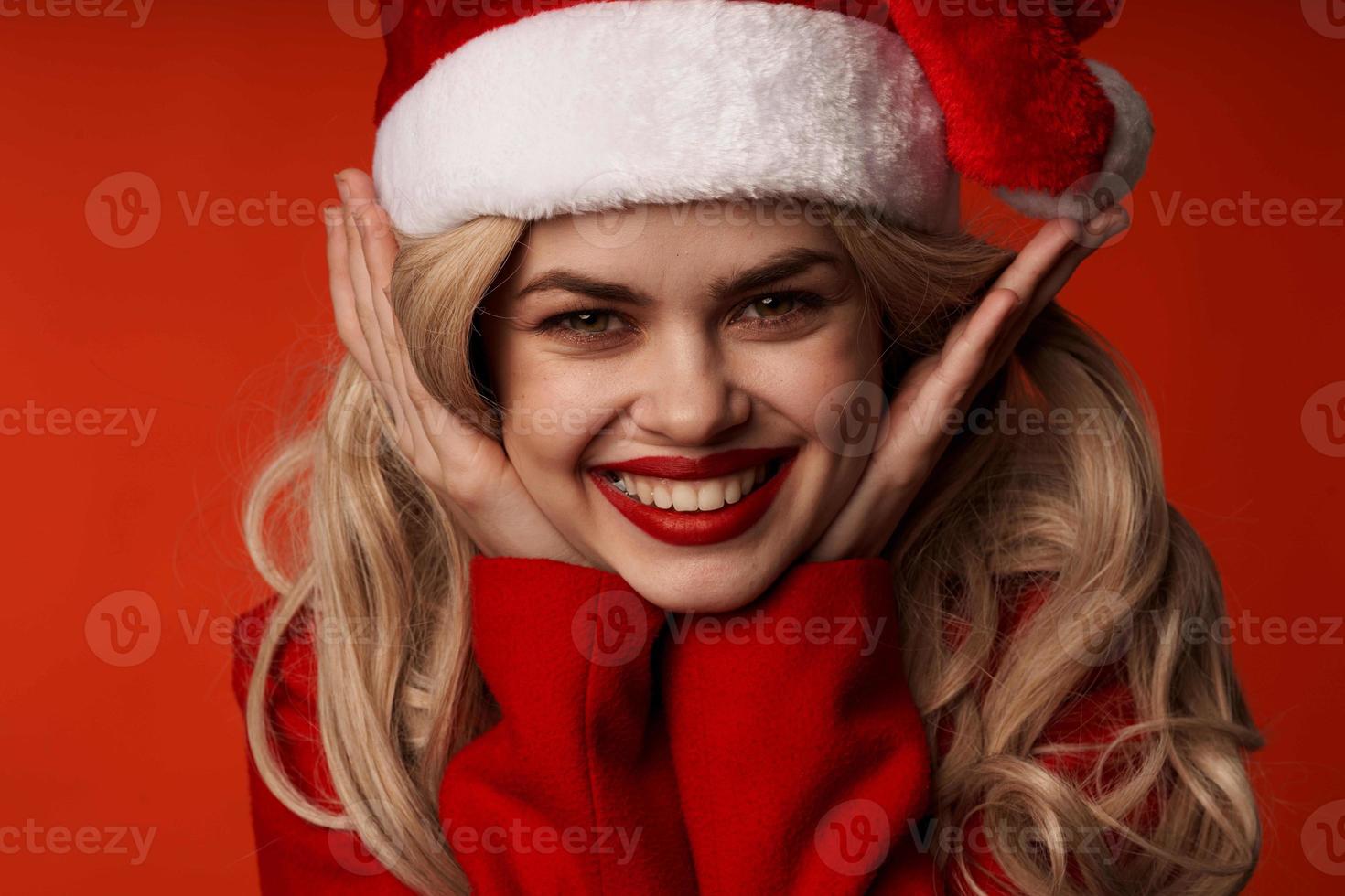 cheerful woman christmas holiday party santa hat photo