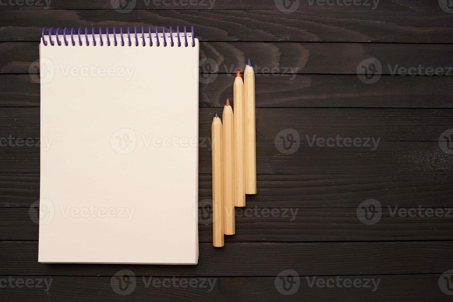 notebook pencils wooden table tools for artists photo