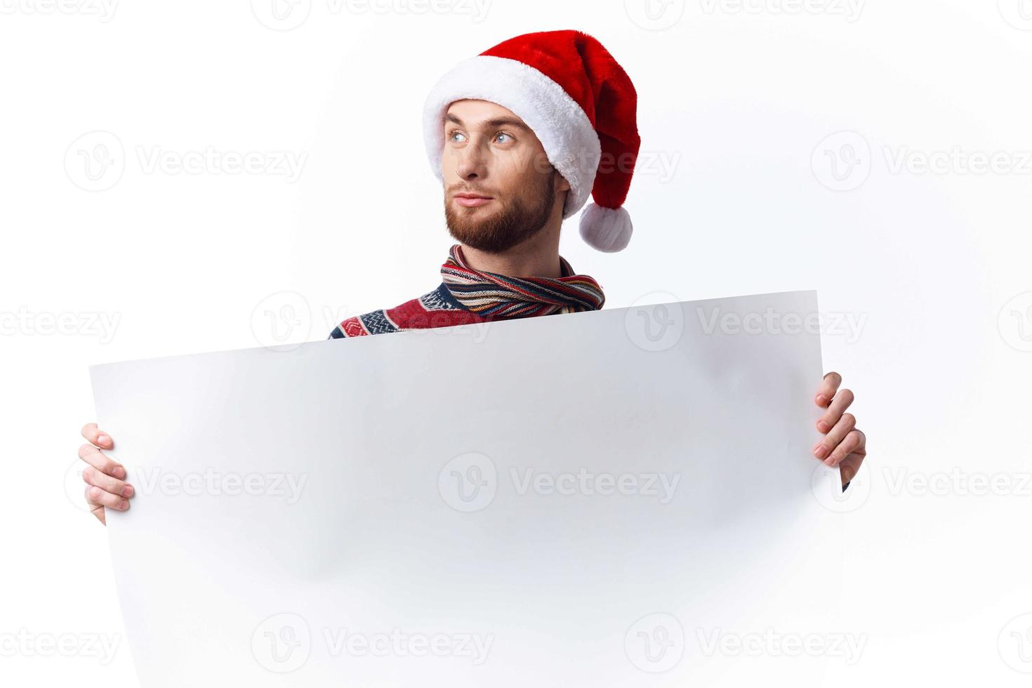 Cheerful man white paper billboard advertising copy-space studio photo
