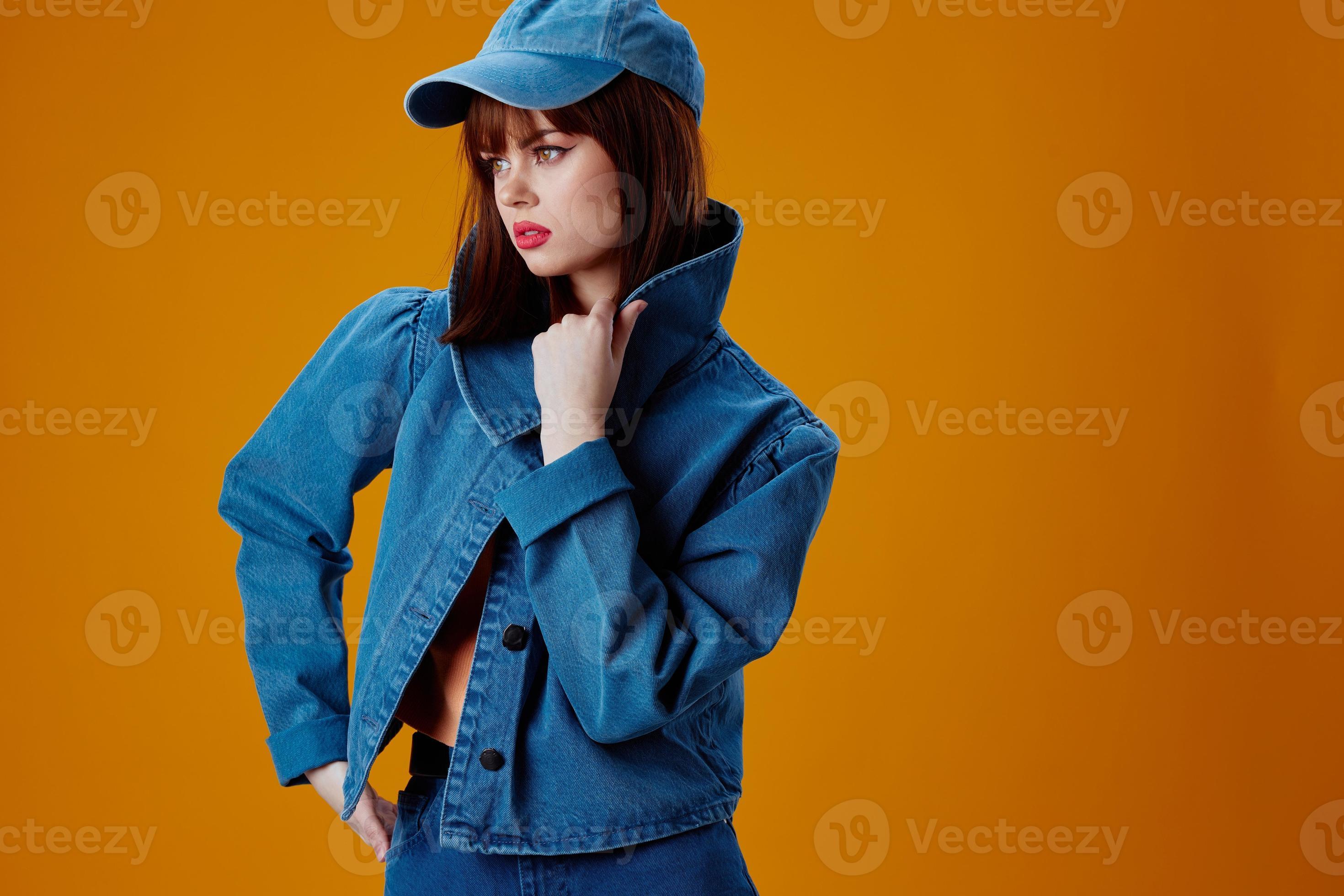 Positive young woman stylish denim clothing posing studio model unaltered  22392034 Stock Photo at Vecteezy