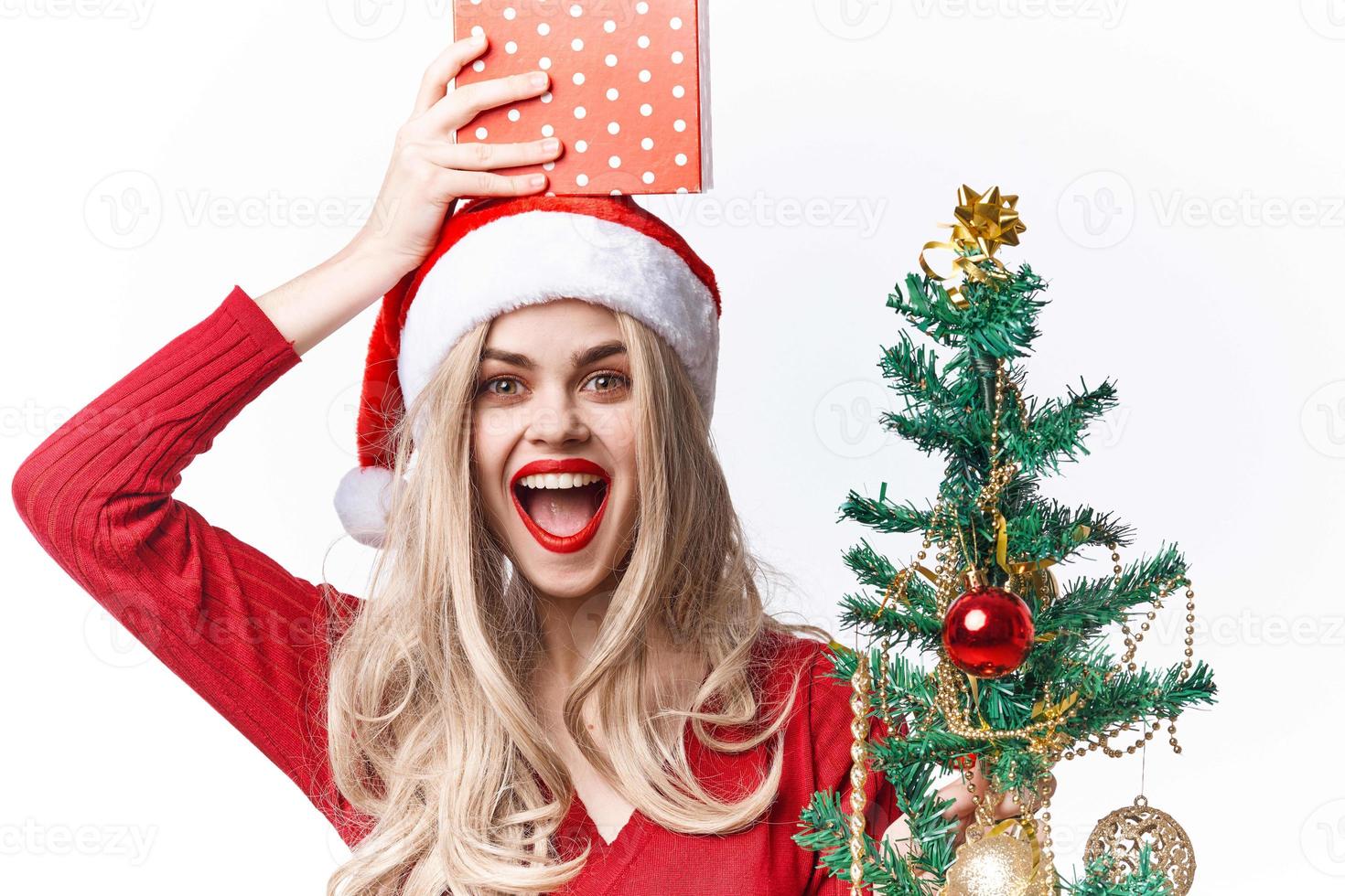 cheerful woman dressed as santa claus toys emotions gift christmas photo