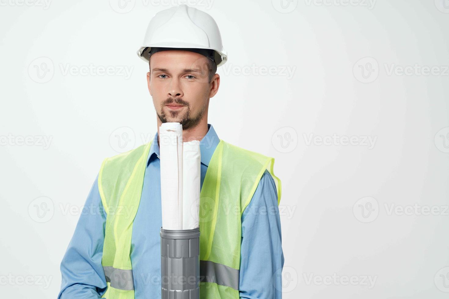 man reflective vest blueprints builder isolated background photo