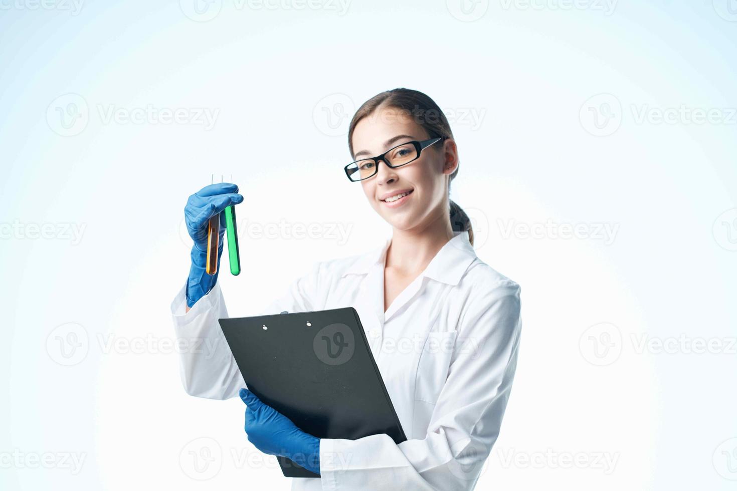 Woman in white coat technology science chemical solution biology photo