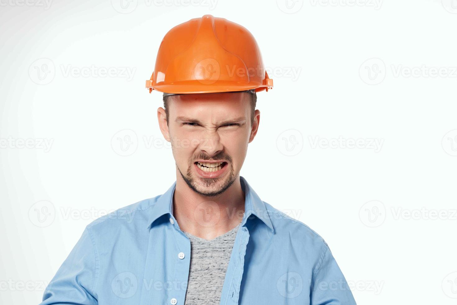 man in construction uniform blueprints builder isolated background photo