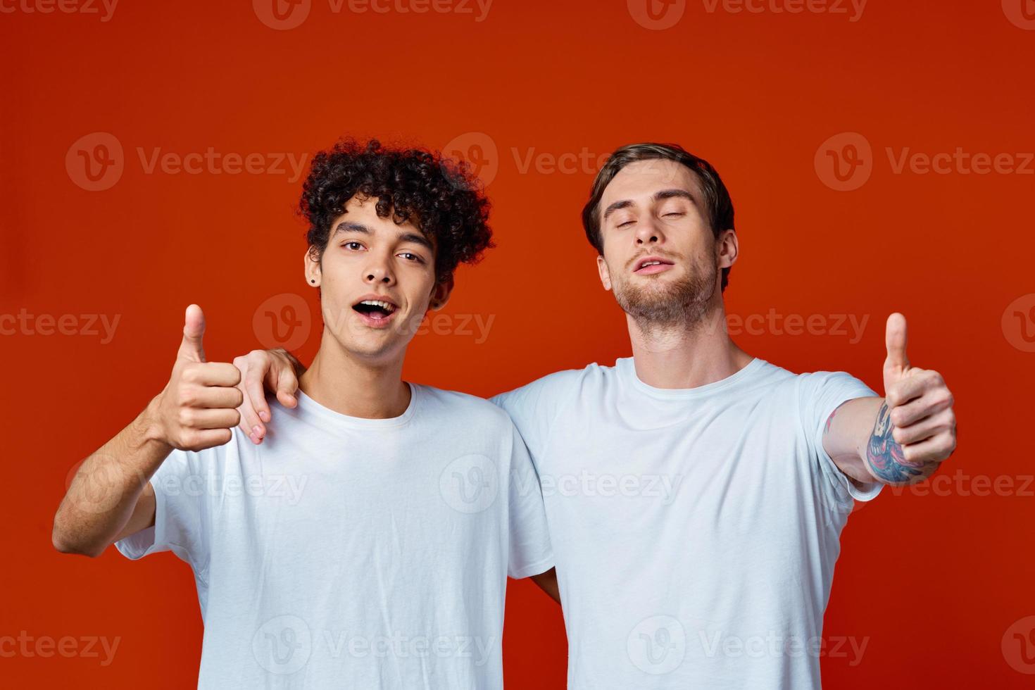 two men stand side by side fun friendship team photo