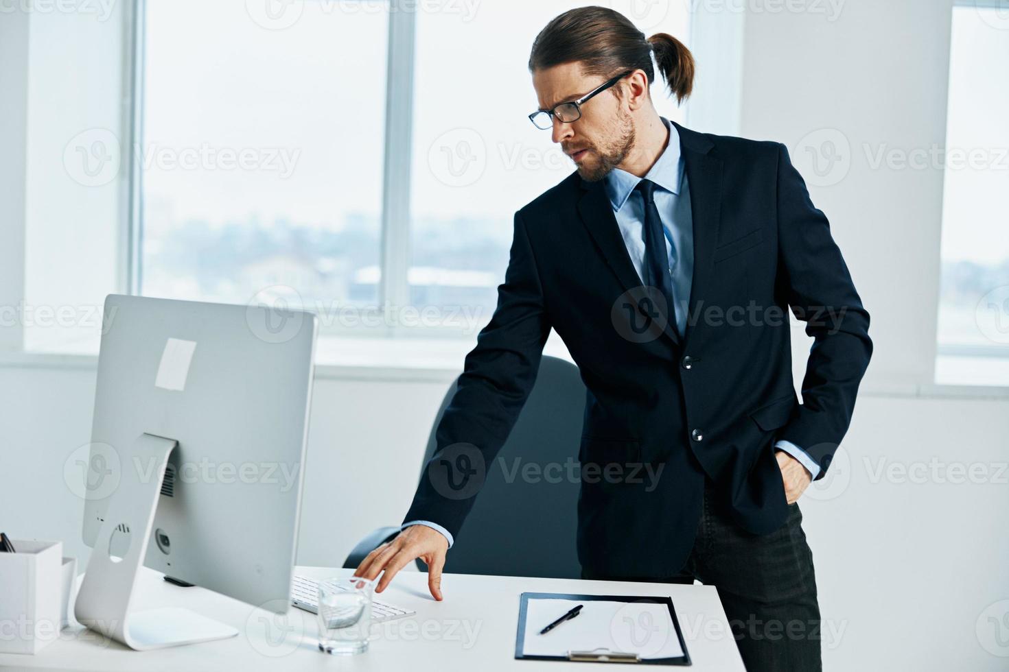 businessman emotions work head documents computer photo